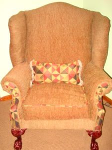 Cozy tan re-upholstered chair